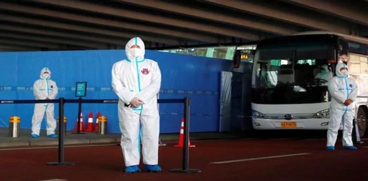 Two WHO members barred from entering China after testing positive for coronavirus