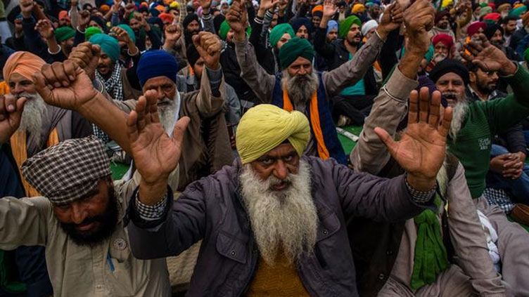 India farmers end year-long  protests against Modi reforms