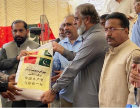 China hands over ration bags to PML-Q for distribution
