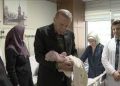 Turkish President recites “call to prayer” in ears of newborn girl