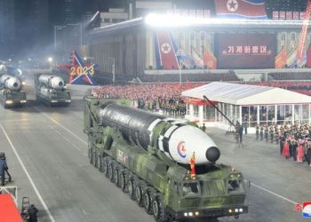 North Korea showcases missile production muscle in nighttime parade
