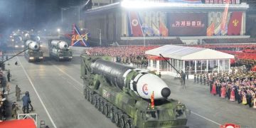 North Korea showcases missile production muscle in nighttime parade