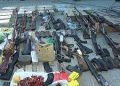 Police seize huge cache of arms from sweet boxes
