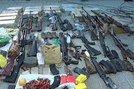 Police seize huge cache of arms from sweet boxes