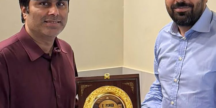 EY Solar CEO Faisal Hameed Presents Appreciation Shield to Dr. Umair Haroon